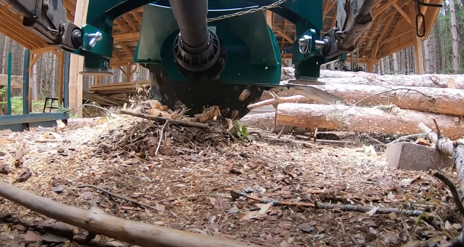 Professional stump grinding equipment in operation creating wood chips for mulch